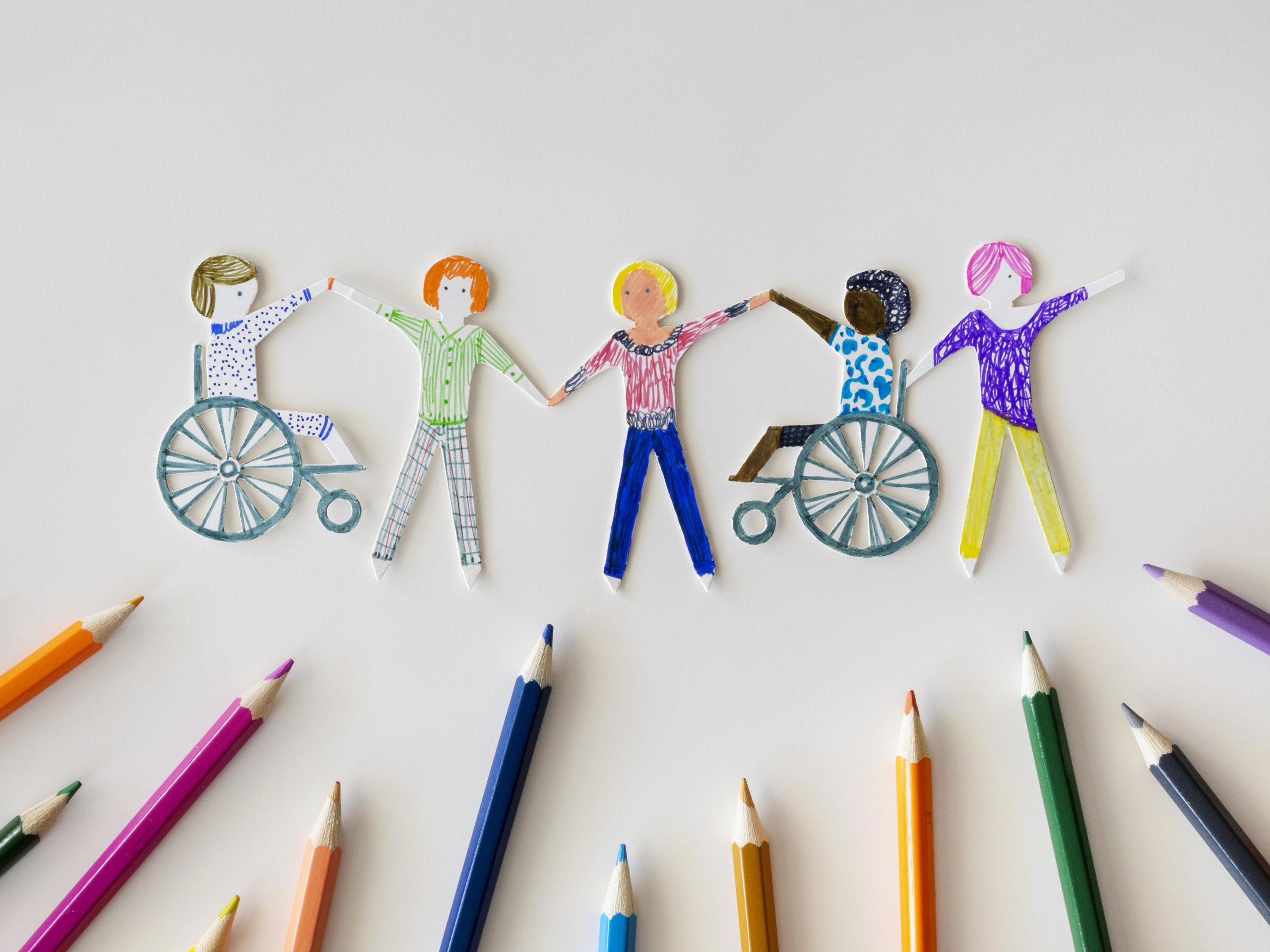 multi-ethnic-and-disabled-people-community-with-pencils
