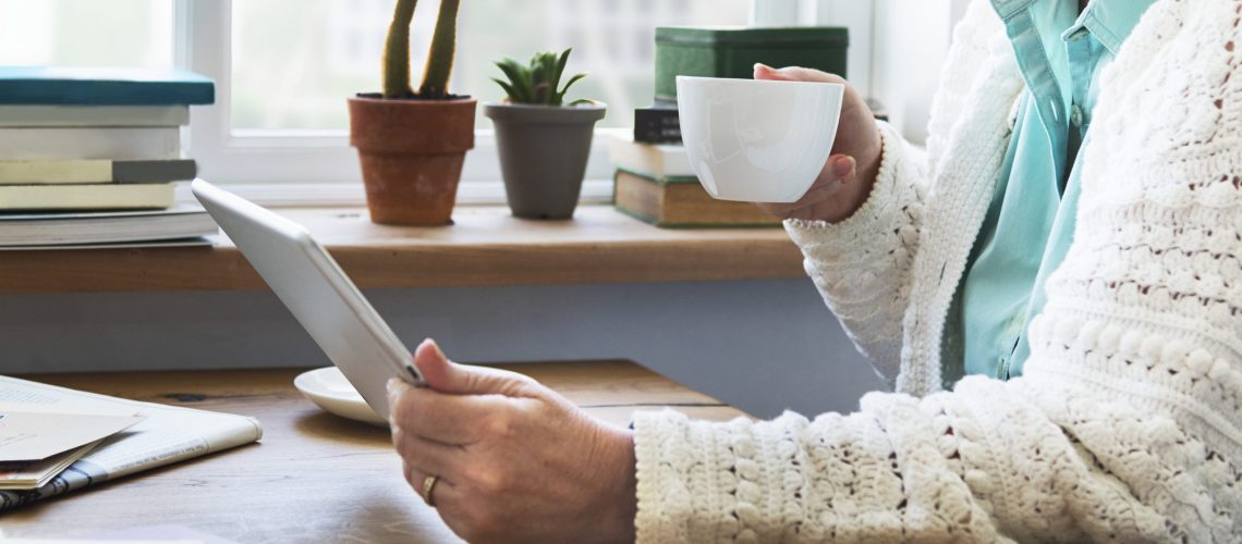 Senior Adult Using Digital Device Tablet Concept