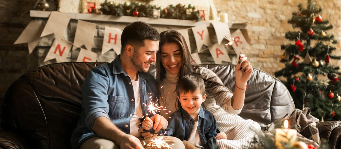 Family on Christmas with bengal lights